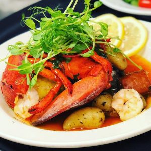 Wouldn't you like to eat our Maine Lobster Bake and dine on a boat?